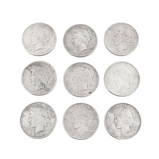 Nine US $1 Silver Peace Coins