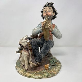 Gorgeous Capodimonte male playing Saxophone statue
