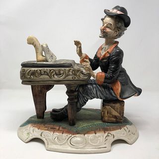 Capodimonte mail statue playing piano