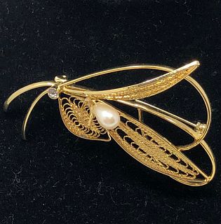 Pretty golden pearly clearstone brooch