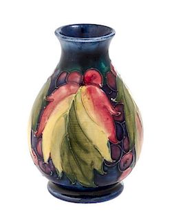 A Moorcroft Pottery Vase Height 4 1/2 inches.