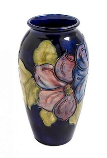 A Moorcroft Pottery Vase Height 7 1/4 inches.