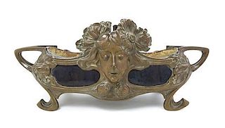 An Art Nouveau Bronze and Ceramic Jardiniere Width over handles 25 1/2 inches.