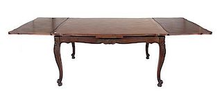 A Louis XV Provincial Style Oak Dining Table Height 30 x width 59 x depth 43 inches.