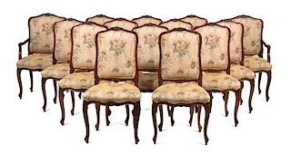 A Set of Fourteen Louis XV Style Mahogany Dining Chairs Height 41 1/2 inches.