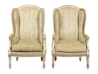 A Pair of Louis XVI Style Painted Bergeres a Oreille Height 46 1/2 inches.