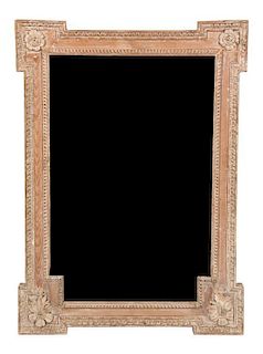 A Louis XVI Style Carved Pine Mirror Height 38 1/2 x width 28 inches.