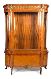 A Louis XVI Style Inlaid Fruitwood Gilt Metal Mounted Display Cabinet Height 71 1/4 x width 48 x depth 16 1/2 inches.