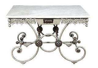 An Iron and Marble Pastry Table Height 29 1/2 x width 44 x depth 26 inches.