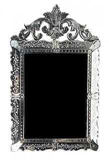 A Venetian Glass Mirror Height 48 x width 29 1/2 inches.