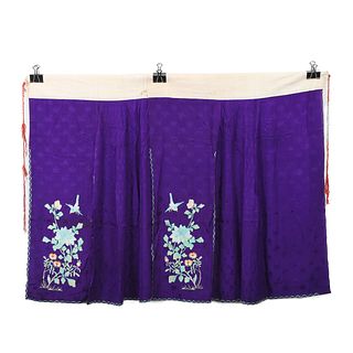 A BLUE-GROUND FLORAL EMBROIDERED SKIRT