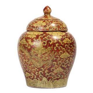 AN IRON-RED AND YELLOW-GLAZED 'DRAGON' JAR