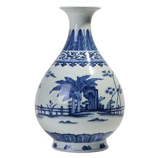 A BLUE AND WHITE 'PALM AND ROCK' VASE