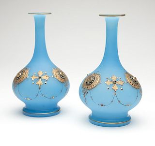 A pair of Continental hand-painted glass vases