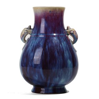 A FLAMBE-GLAZED VASE WITH HANDLES