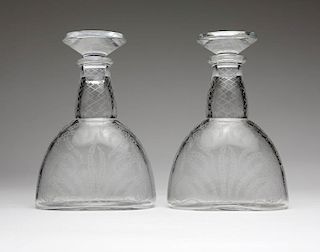 A pair of Baccarat etched clear crystal decanters