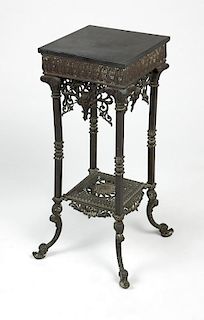 A Victorian bronze and onyx plant stand