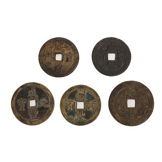 A GROUP OF FIVE BRONZE COINS