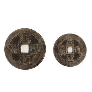 TWO SILVER COINS