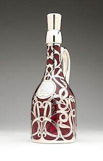 A Gorham .999 silver-overlaid ruby glass decanter