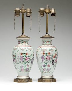 A pair of famille rose vases mounted as lamps