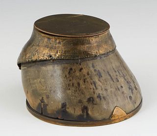 English Brass Horse Hoof Inkwell, early 20th c., the lifting lid over a brass rimmed glass ink pot, H.- 2 3/4 in., W.- 4 1/4 in., D.- 5 1/4 in.