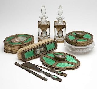 A French guilloche and gilt-bronze dresser set