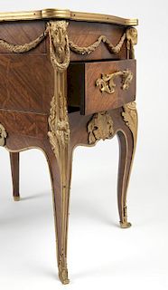 A gilt bronze-mounted parquetry bedside cabinet