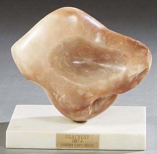 Sandra Zahn Oreck (1940-, American) "Seacrest," 1974, a carved taupe alabaster free-form tabletop sculpture on a rectangular, polished white Carrara m