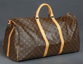 Louis Vuitton Keepall Bandouliere 60 Travel Bag, in brown monogram coated canvas with golden brass hardware and vachetta handles, opening to a brown c
