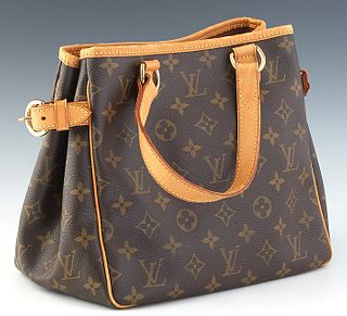 Louis Vuitton Batignolles PM Shoulder Bag, in brown monogram coated canvas with golden brass hardware and vachetta straps, opening to a canvas lined i