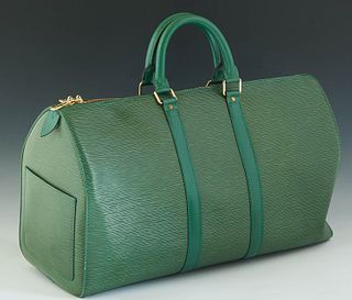 Louis Vuitton Keepall 45 Travel Bag, in green epi calf leather with golden brass hard, opening to a green suede lined interior, H.- 11 in., W.- 18 3/4