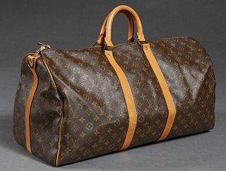 Louis Vuitton Keepall Bandouliere 55 Travel Bag, in a monogram coated canvas exterior, with vachetta leather accents and golden brass hardware, openin