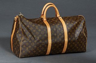 Louis Vuitton Keepall Bandouliere 55 Travel Bag, in a monogram coated canvas exterior, with vachetta leather accents and golden brass hardware, openin