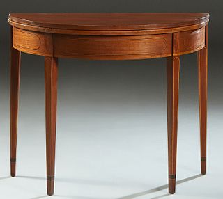 English Style Inlaid Mahogany Hepplewhite Style Demilune Games Table, 20th c., the circular top on inlaid tapered square legs, H.- 29 5/8 in., W.- 35 