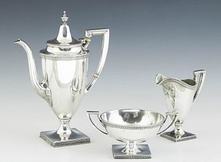 Three Piece Sterling Coffee Service, by Gorham, # 9811, in the "Etruscan" pattern, consisting of a coffee pot, creamer and open sugar bowl, each with 