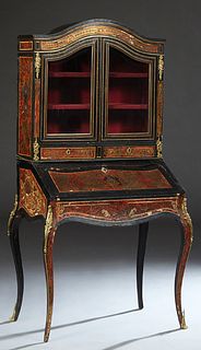 Louis XV Style Ormolu Mounted Boulle Slant Front Secretary Bookcase, early 20th c., the arched top over double beveled glazed doors above two shallow 
