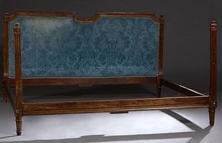 Unusual French Louis XVI Style Carved Oak King Size Bed, c. 1900 and later, constructed from the joined elements of a daybed, the padded headboard wit