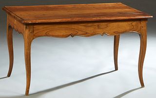 French Provincial Louis XV Style Coffee Table, early 20th c., the stepped rounded edge rectangular top over a scalloped serpentine skirt, on reeded ca