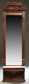 American Aesthetic Period Carved Mahogany Marble Top Pier Mirror, late 19th c., the carved crest over a stepped crown above a rectangular plate flanke