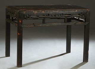 Chinese Ming Dynasty Black Lacquered Wine Table, 17th c., the rectangular top over a pierced geometric skirt, on reeded rectangular legs, H.- 32 in., 