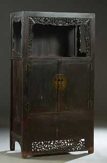 Chinese Ming Dynasty Carved Hardwood Display Cabinet, 17th c., Shanxi province, the rectangular top over open storage within three pierced floral and 