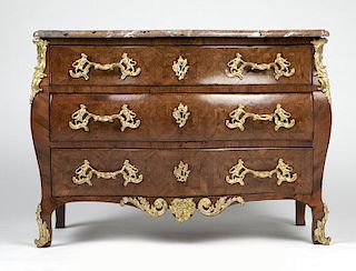 A Louis XV-style bombe parquetry commode