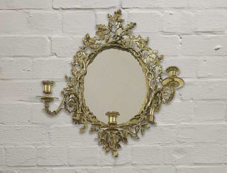 A gilt brass girandole wall mirror,