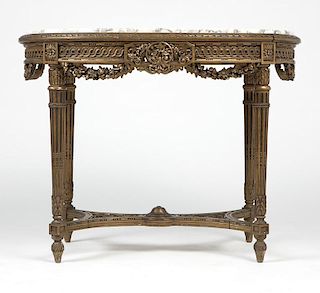 A Louis XVI-style carved and giltwood table