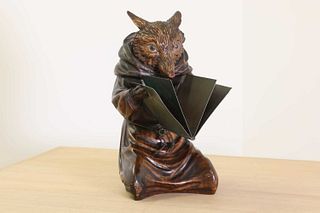 A Swiss Black Forest carved lindenwood figure of a fox,