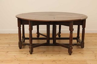 An oak double gateleg table,