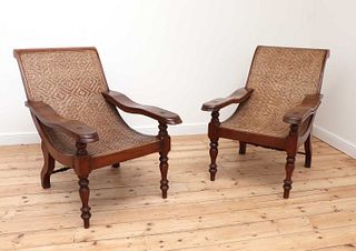 A pair of Indian teak planter's chairs,