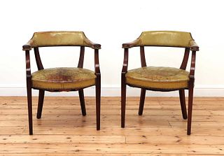 A pair of Continental mahogany open armchairs,