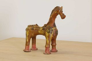 A Turkish pottery aquamanile in the form of a horse,
